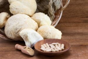 medicinal mushrooms image of lion's mane and capsules