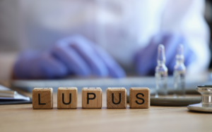 Articles by Suzy Cohen, America’s Pharmacist® 39 Nurse with building blocks that say LUPUS