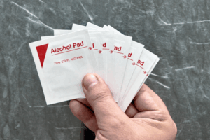 Articles by Suzy Cohen, America’s Pharmacist® 44 A hand holding several alcohol pads in packages