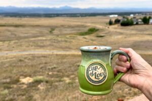 coffee with longs peak in the background